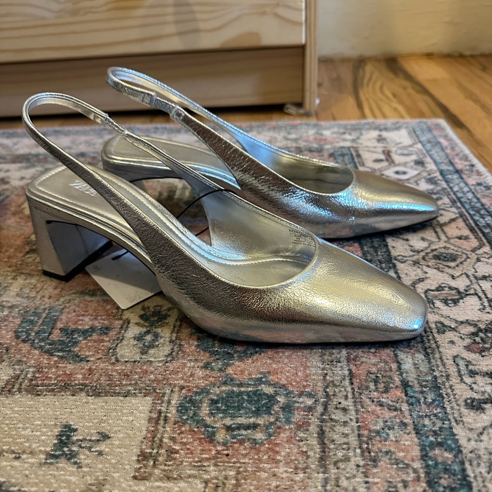 Silver sling back heels